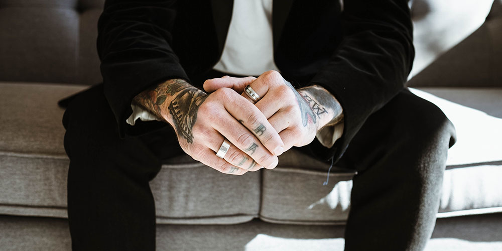 Stick to your tattoos during a job interview: It's a part of your personality and your employer will find out about them sooner or later anyway. 